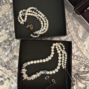 Long white pearl necklace and bracelet